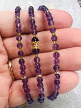 Load image into Gallery viewer, Amethyst Blossom Whisper - Elegant Triple Band 18kt Gold Bracelet